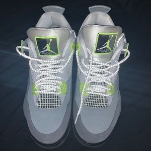 Lime green and gray Jordan 4s